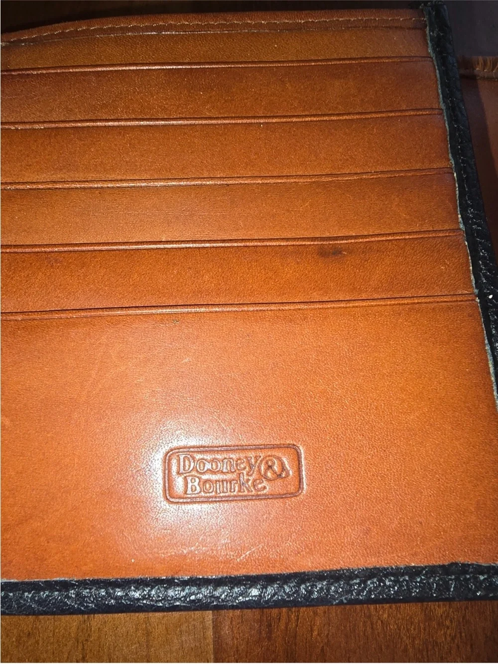 Dooney & Bourke Black and Brown Leather Bi-Fold Wallet vintage.
